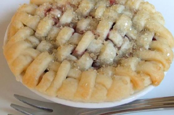 Bourbon-Infused Mini Cherry Pies with Pecan Streusel recipe by Meaghan Moineau