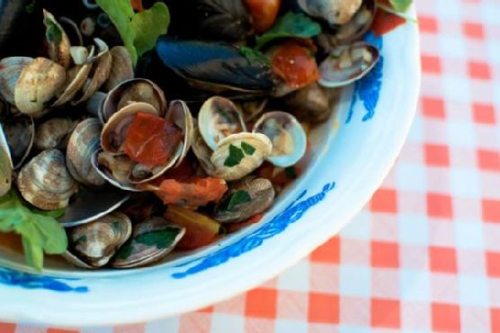 Spicy Saffron Mussels & Clams in White Wine Broth recipe by Meaghan Moineau