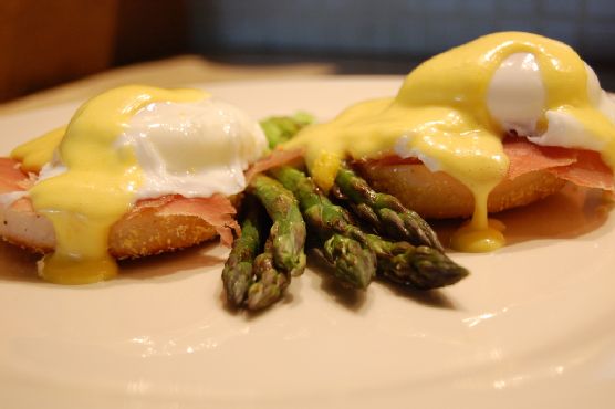 Asparagus Eggs Benedict with Truffle Hollandaise and Prosciutto recipe by Meaghan Moineau