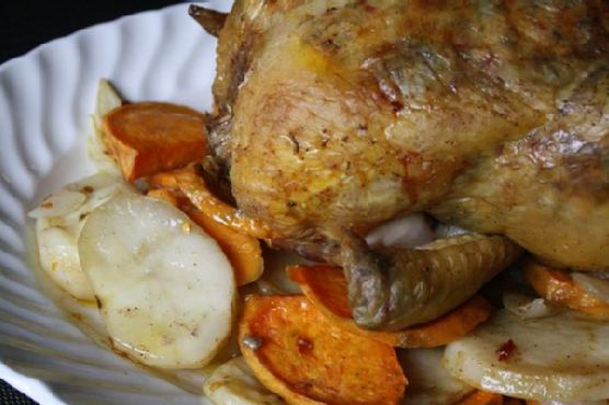 Herb-Crusted Lemon Roast Chicken with Truffle-Infused Potatoes recipe by Meaghan Moineau