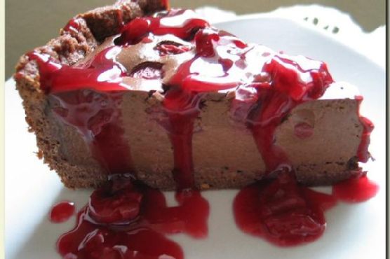 Decadent Black Forest Cheesecake with Kirsch-Infused Cherry Glaze recipe by Meaghan Moineau