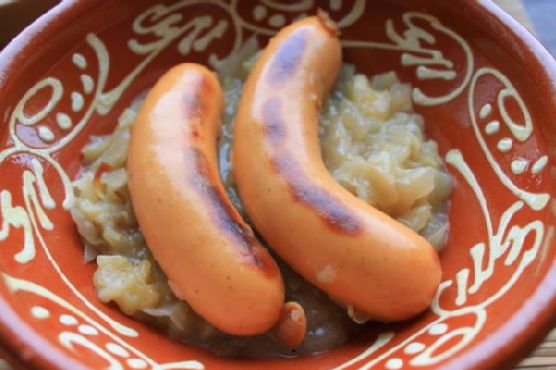 Smoky Knockwurst with Spiced Apple Sauerkraut recipe by Meaghan Moineau