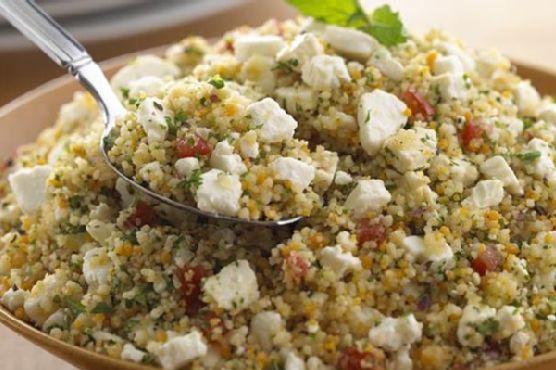 Mediterranean Feta Couscous Salad with Zesty Pomegranate Dressing recipe by Meaghan Moineau