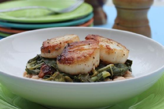 Seared Scallops with Citrus-Infused Wilted Greens and Crispy Prosciutto recipe by Meaghan Moineau