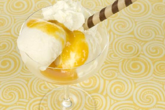 Tropical Cheesecake Ice Cream with Spiced Mango-Lime Syrup recipe by Meaghan Moineau