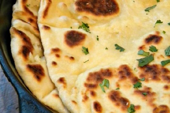 Truffle-Infused Garlic-Butter Naan with Parmesan Crisps recipe by Meaghan Moineau